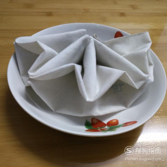 餐巾折花盘花的折法