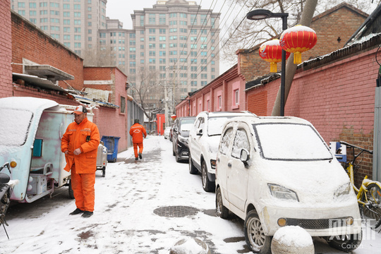 北京降雪节后“开工” 雪中京城银装素裹(3) 第3页