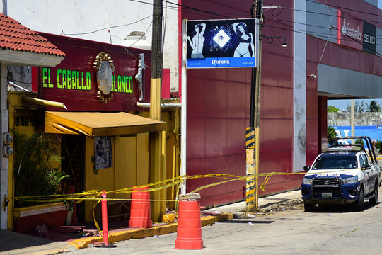 贩毒组织抢地盘 墨西哥酒吧纵火事件致28人死亡 第1页